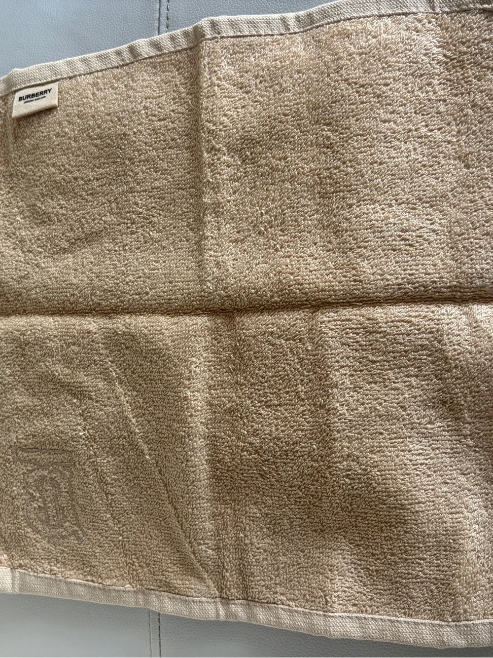 Burberry Beige Embossed Monogram Wash Cloth